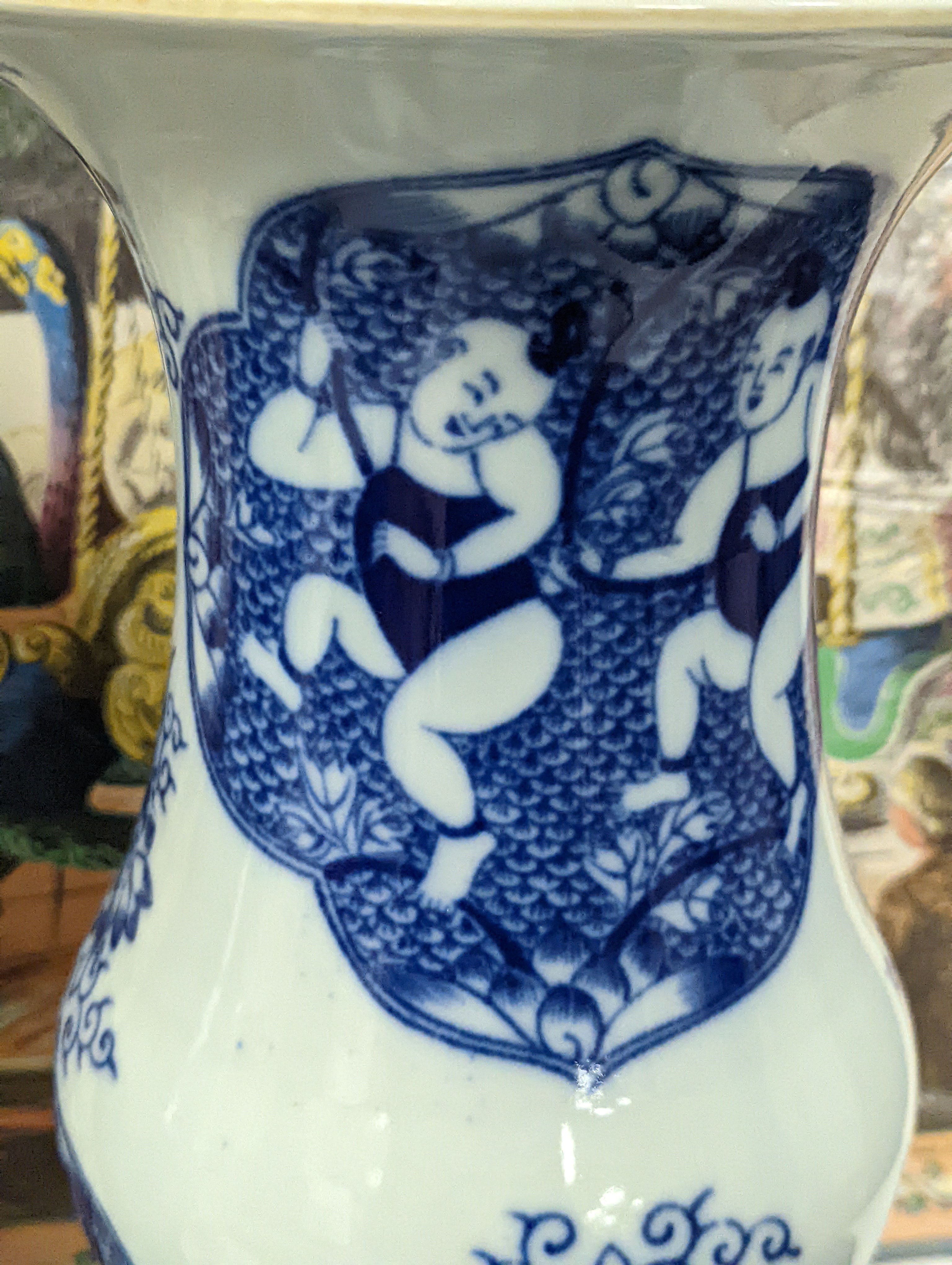 A pair of Chinese blue and white vases on stands and 6 further wood stands. Vases 35cm